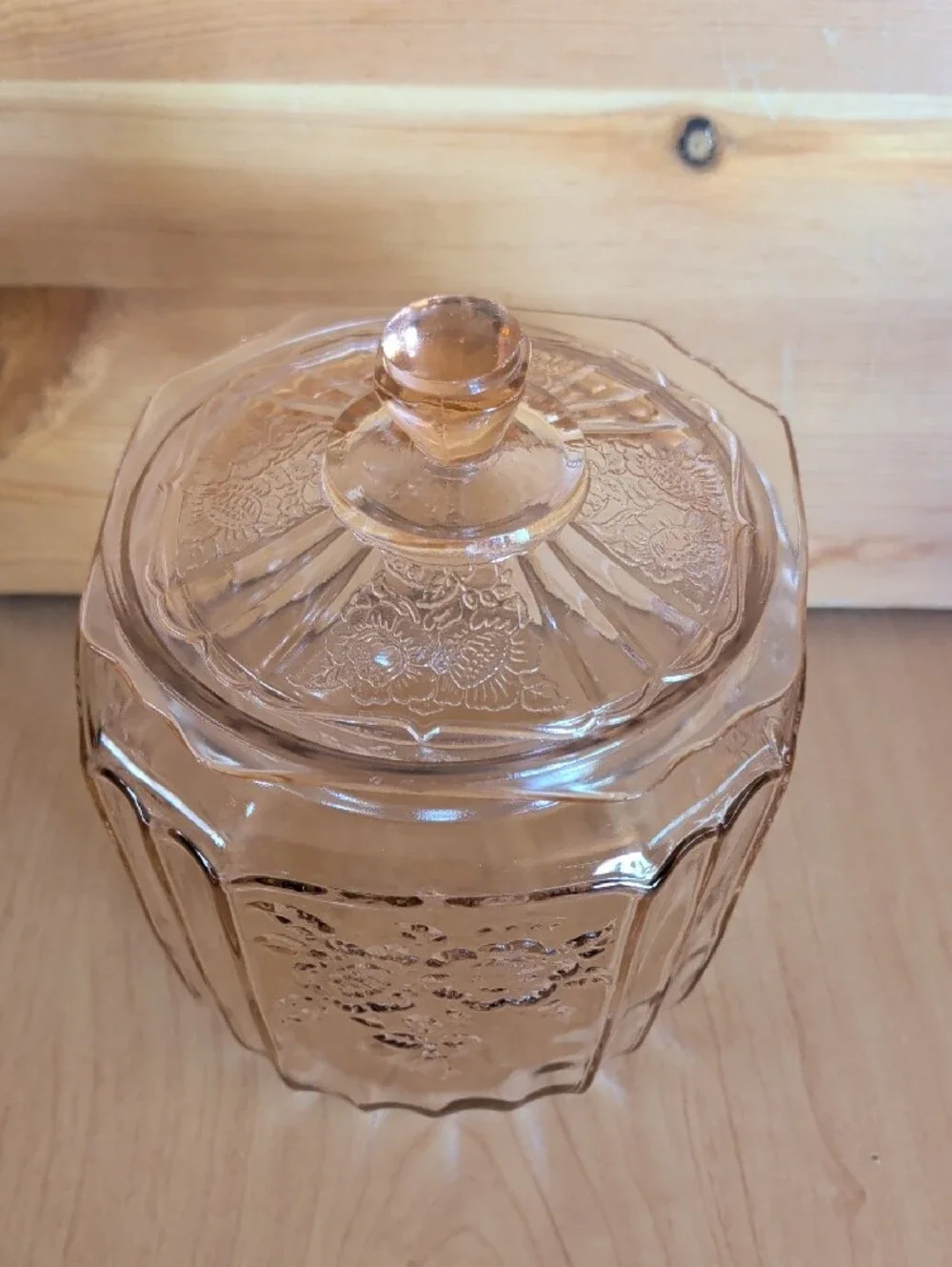 VTG. Pink Pressed Glass Cookie Jar with Lid and Floral Motif.